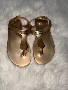 Michael Kors Metallic Gold Jelly T-Strap Sandals with Ankle Buckle